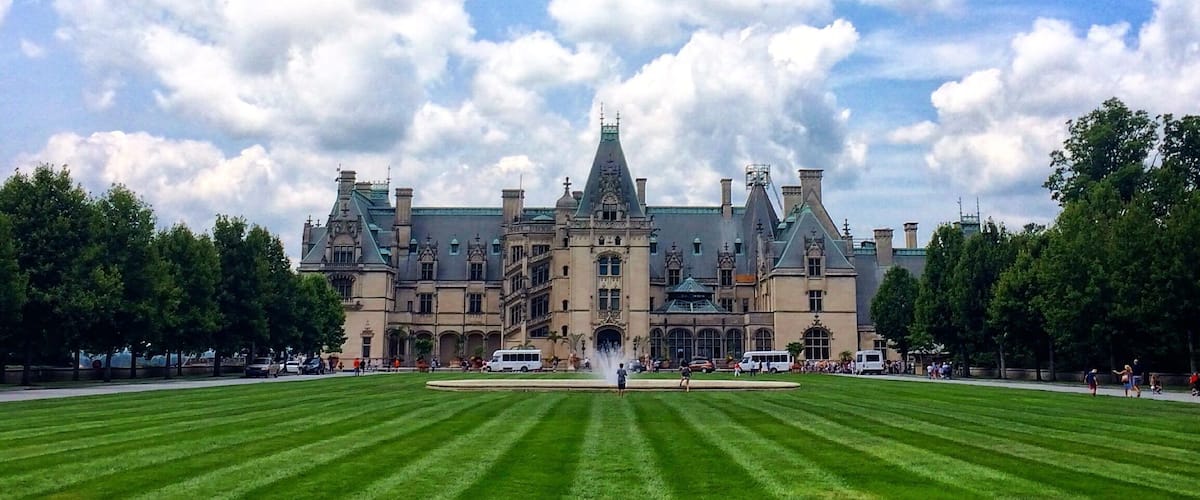 The Biltmore Estate in Asheville, NC. If you are in Asheville, stopping at The Biltmore Estate is a must. Fair warning: be prepared to spend a good chunk of a day there. Read more about it here: http://bit.ly/1JpjLcf