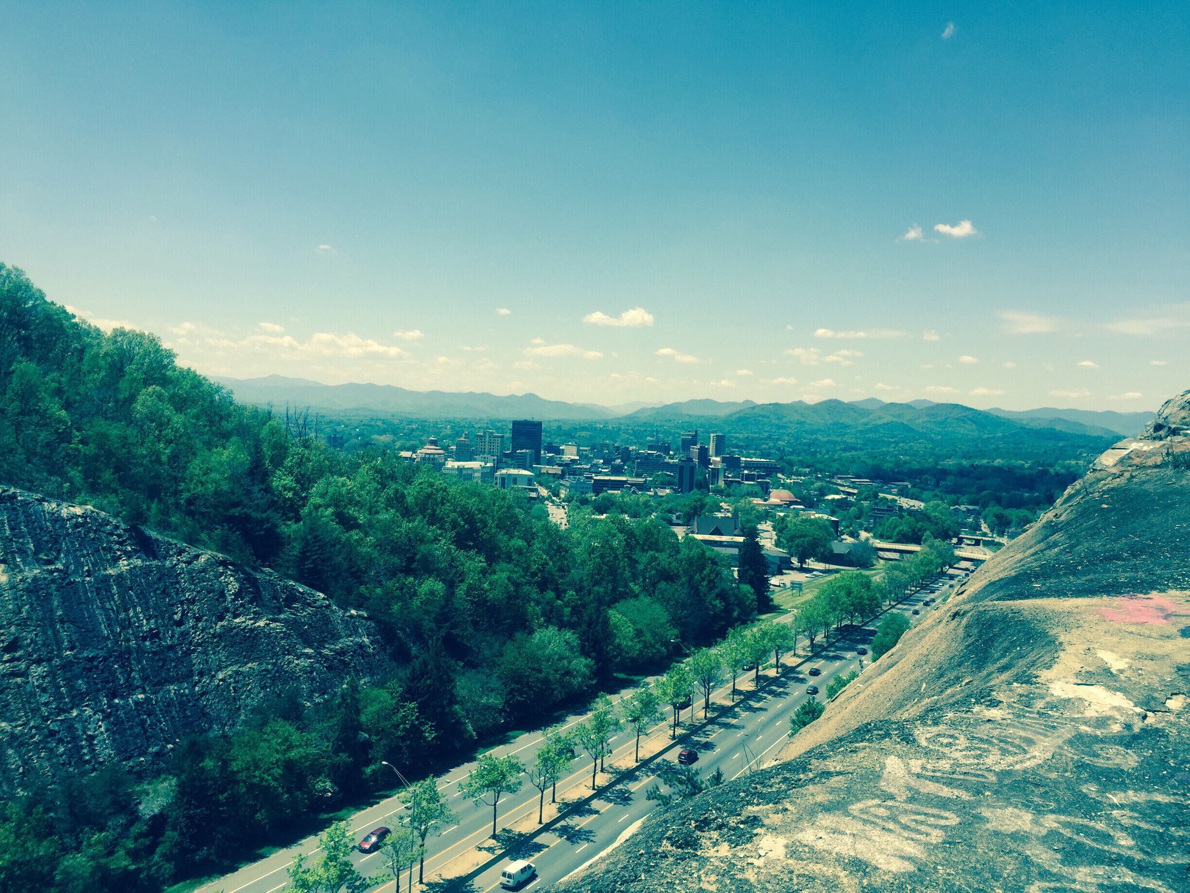 This is "The Cut" in Asheville, it is a spot that overlooks the beautiful city of Asheville. People come here for a variety of reasons but one of the most interesting reasons is to spray paint graffiti on the rock and express them self. You can see a hint of this in the bottom right hand corner. Appalachian residents enjoy sharing their opinions and thoughts just like anyone else but as you can see they do it maybe just a little differently. This picture illustrates the unique balance that the Appalachian region has of nature and civilization. Not many places could do this and have them blend so nicely but the Appalachian area can and has.
#appalachianechoes