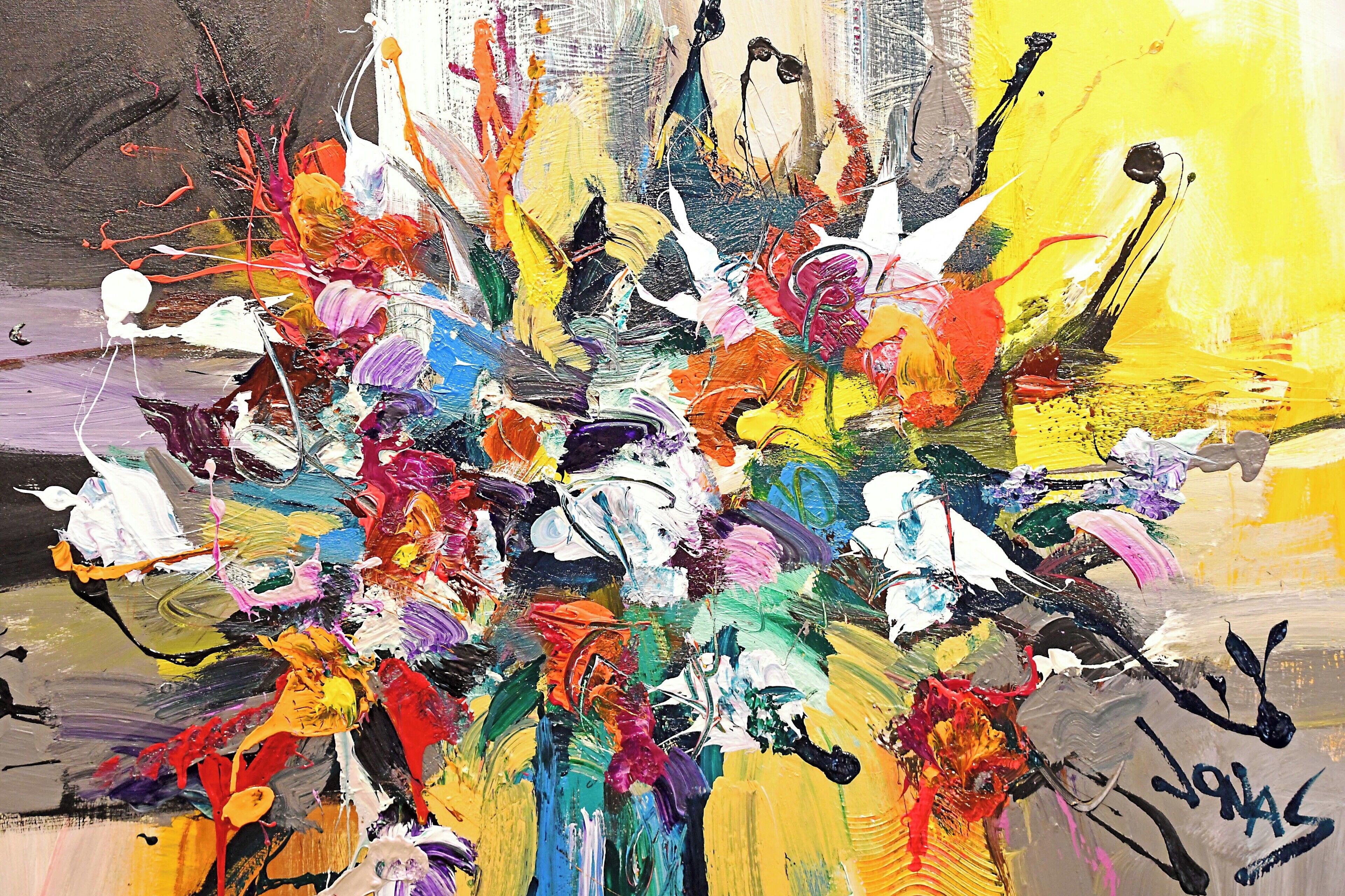 A self-styled abstract expressionist, Jonas Gerard paints to rhythmic world music, allowing his subconscious to guide him to create art filled with light, color and warmth. Jonas maintains two galleries in the Asheville River Arts District.

When we visited his studio we were encouraged to touch and even photograph his work.