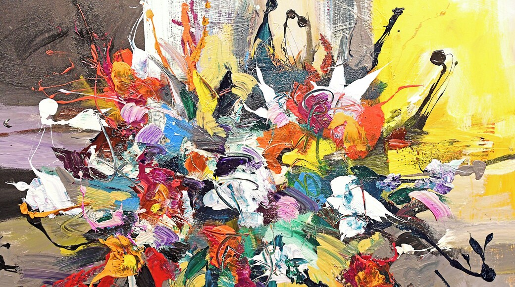 A self-styled abstract expressionist, Jonas Gerard paints to rhythmic world music, allowing his subconscious to guide him to create art filled with light, color and warmth. Jonas maintains two galleries in the Asheville River Arts District.
When we visited his studio we were encouraged to touch and even photograph his work.