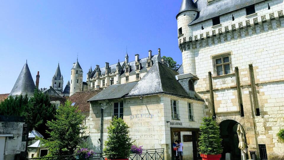 A historic castle with multiple towers and a bar lounge.