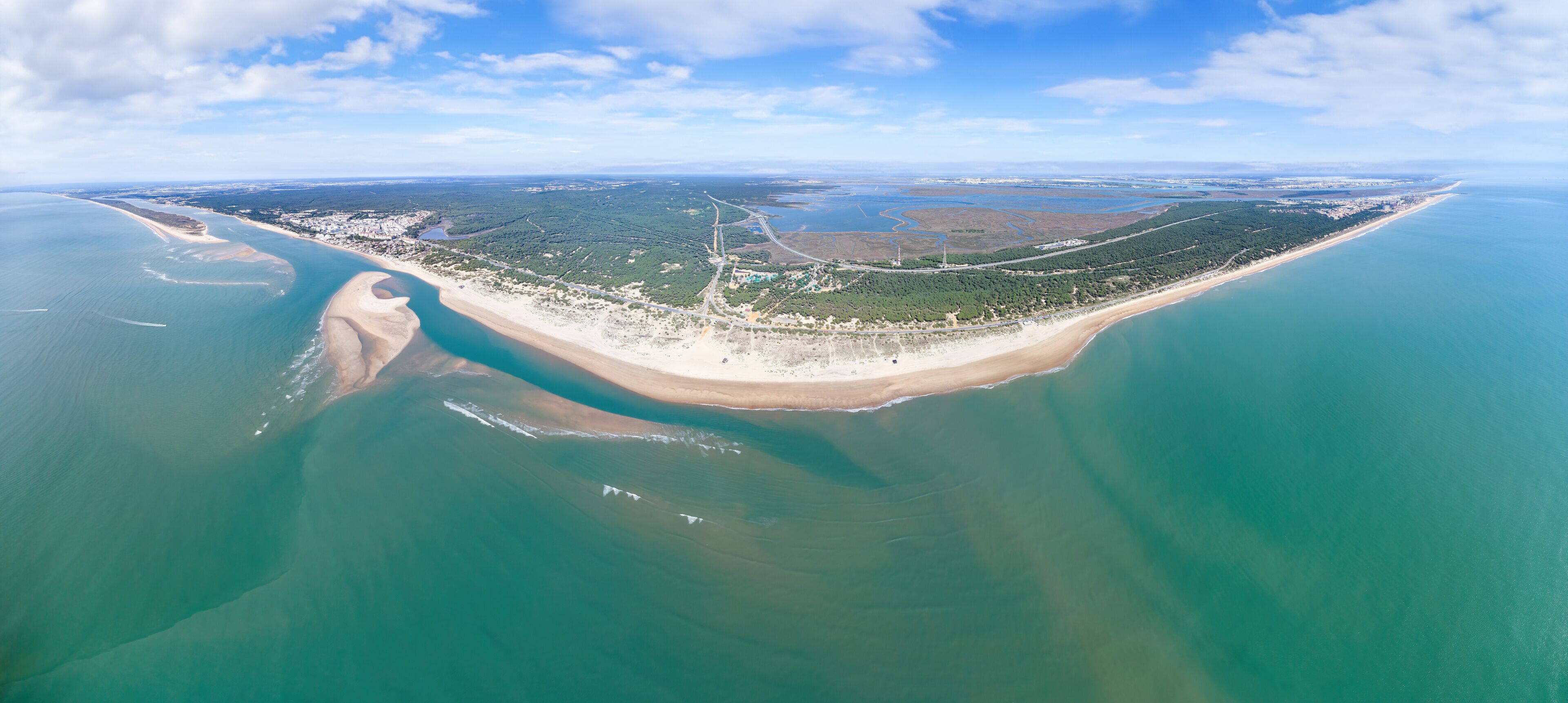 Aerial drone view of the beaches of Cartaya and Punta Umbria, with La Bota beach, El Portil, El Rompido, La Flecha, and Los Enebrales and the natural area Marismas del Odiel in the background