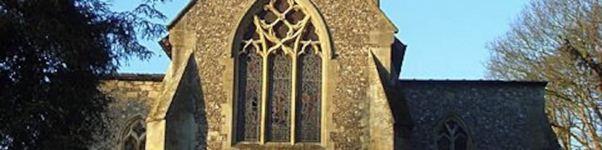 St Mary's, Chesham The east end of the medieval parish church. It stands to the west of the town centre, but somewhat cut off from it by the A416. The town centre is located in a narrow strip in the bottom of the Chess valley with countryside rising to the east and west.