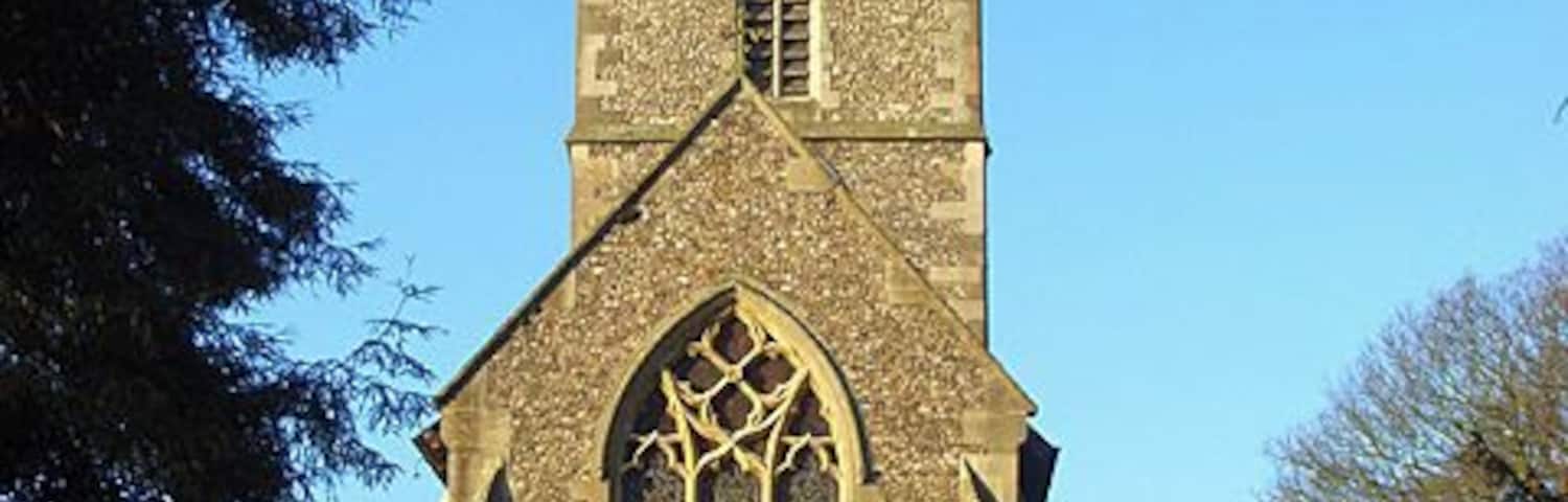 St Mary's, Chesham The east end of the medieval parish church. It stands to the west of the town centre, but somewhat cut off from it by the A416. The town centre is located in a narrow strip in the bottom of the Chess valley with countryside rising to the east and west.