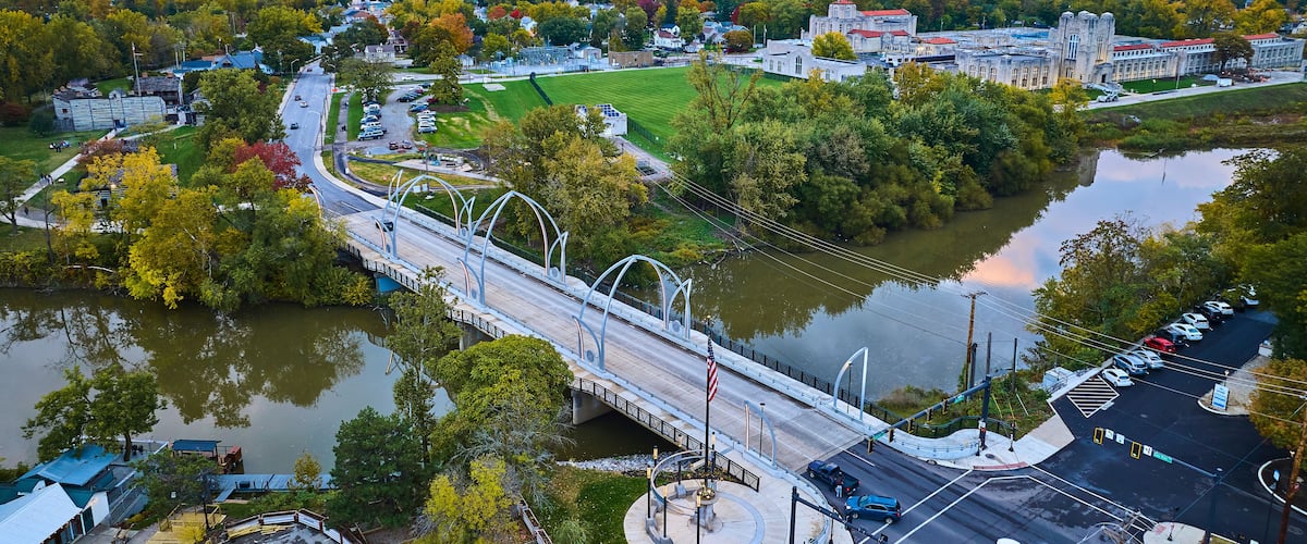 Aerial View of Riverside Town at Dusk with Veterans Memorial Bridge, Fort Wayne
