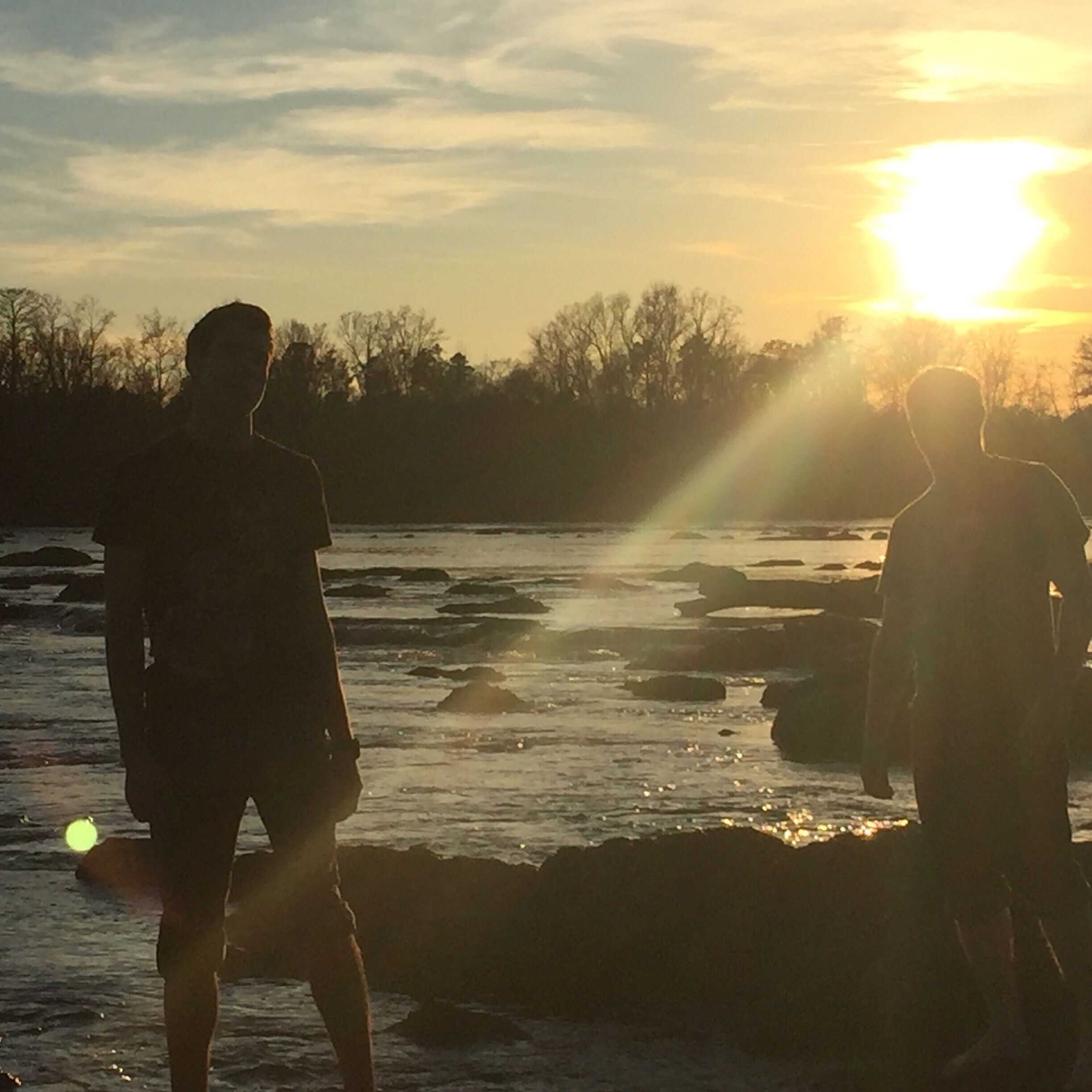 Traversing the rocks on the Savannah River at sunset. 