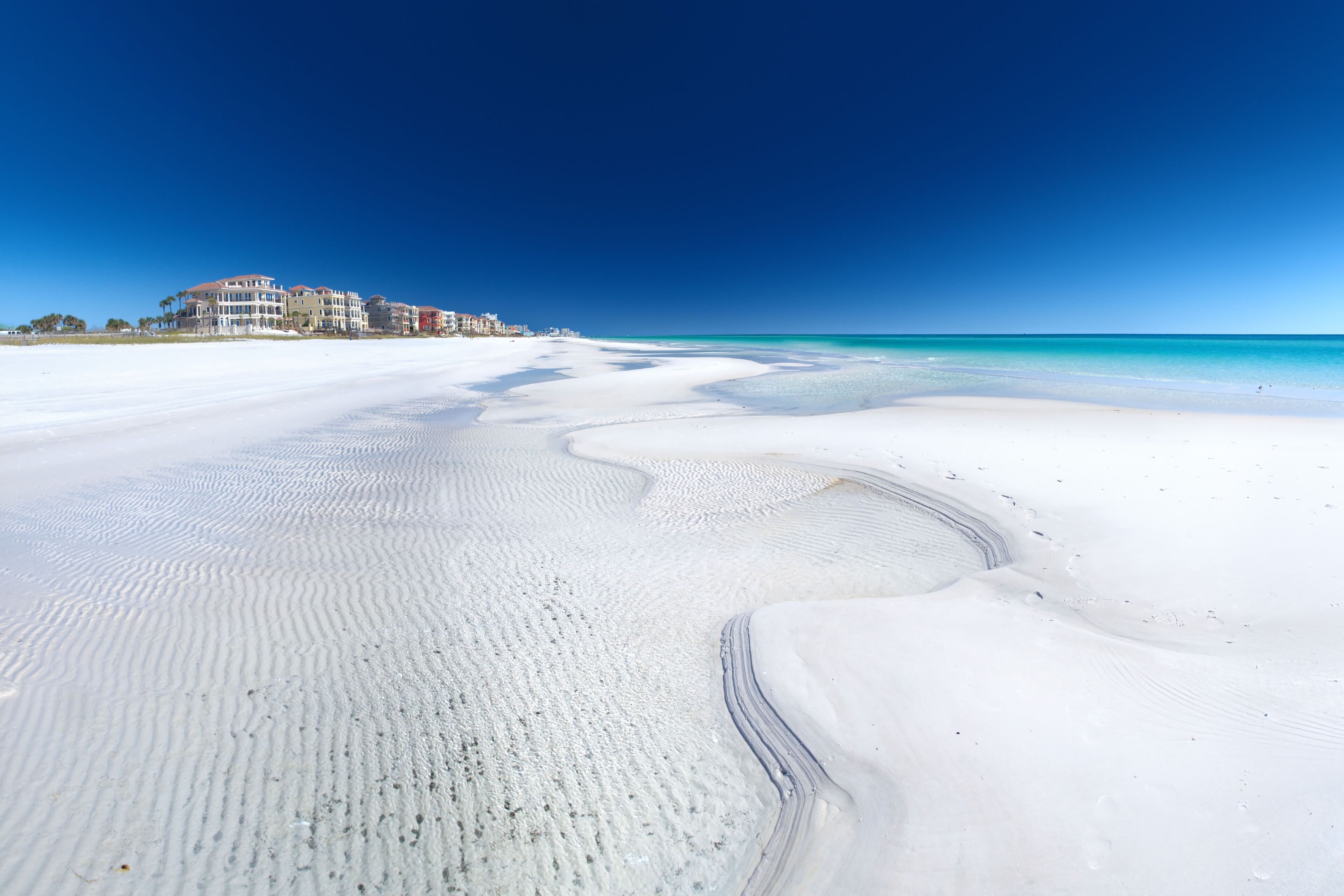 White sand and emerald green sea on the Gulf Coast of Florida.