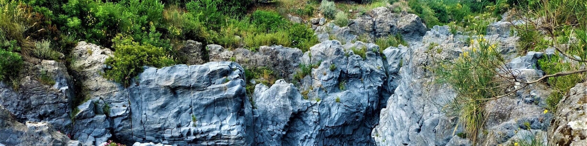 A rocky gorge with a flowing river.