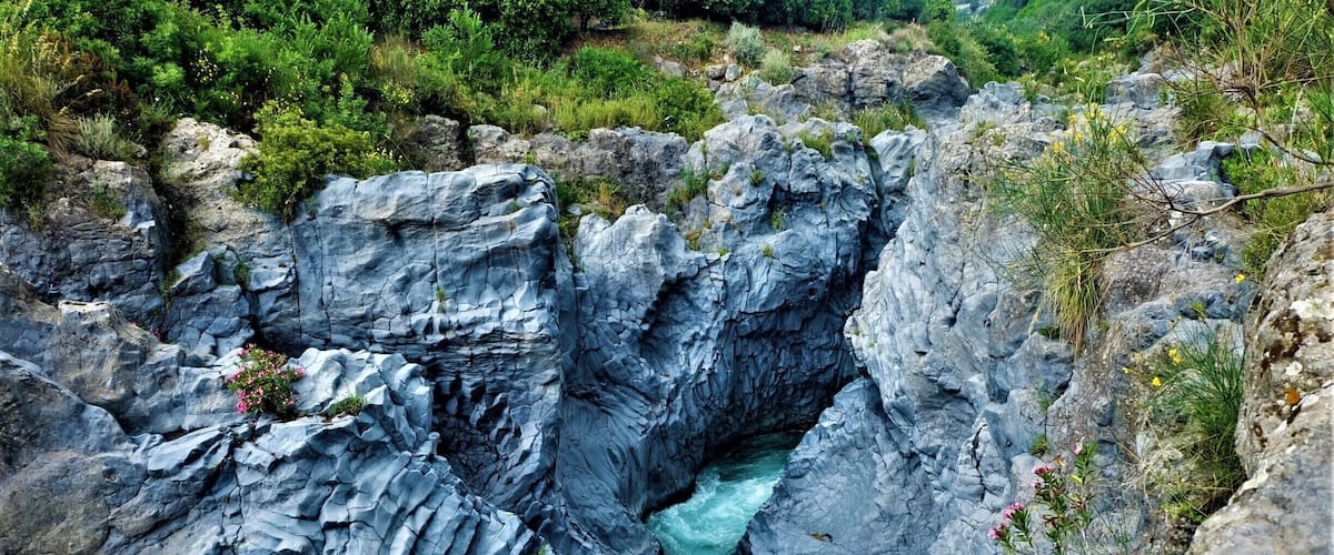 A rocky gorge with a flowing river.