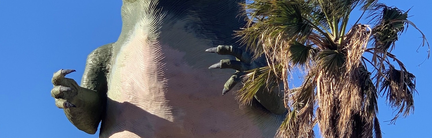 The dinosaurs located off highway 10 in Cabazon, CA. You can go inside.