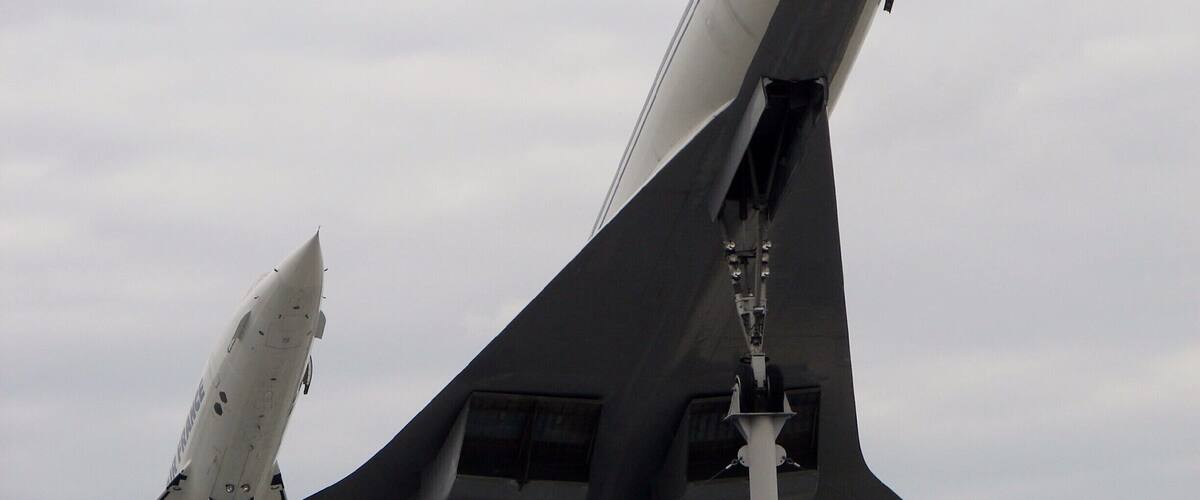 A military aircraft with a vertical stabilizer and a tail fin.