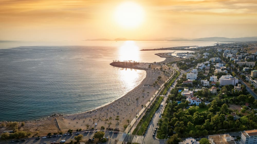 The coastline of Glyfa´da, south Athens, Greece, with beaches and marinas during summer sunset time