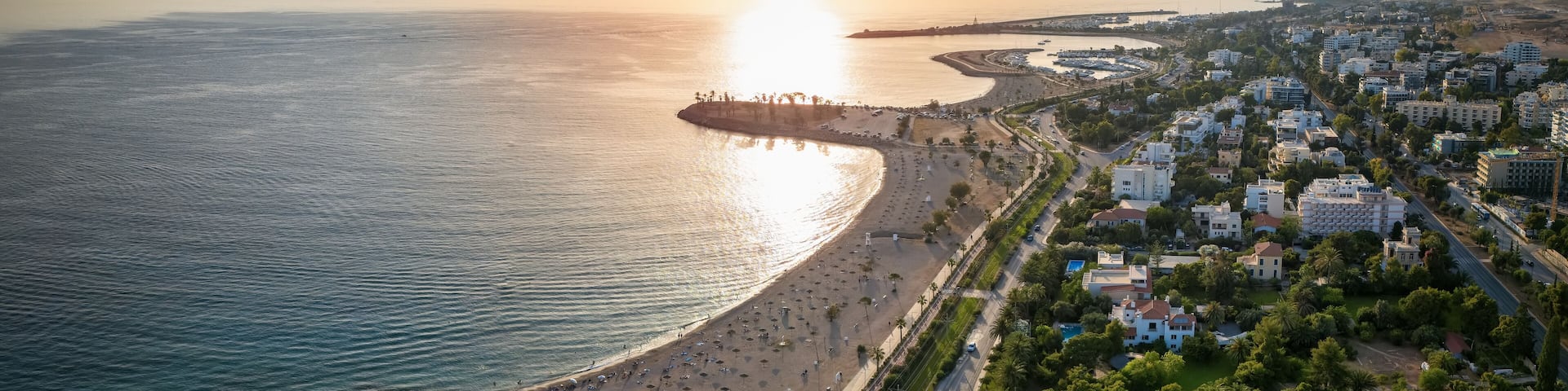 The coastline of Glyfa´da, south Athens, Greece, with beaches and marinas during summer sunset time