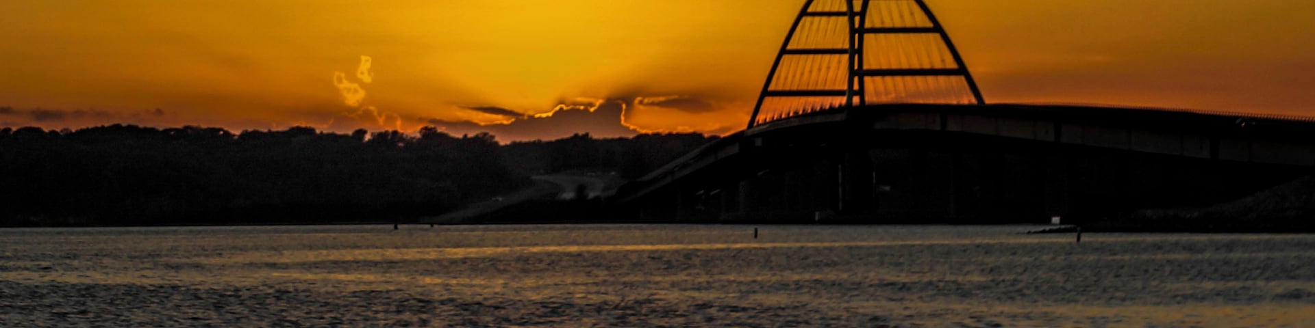 This is one place I always visit when I'm in Benton KY. This bridge was opened in 2016 after a barge hit the original bridge. I always know that coming here I'll get a good sunset photo.