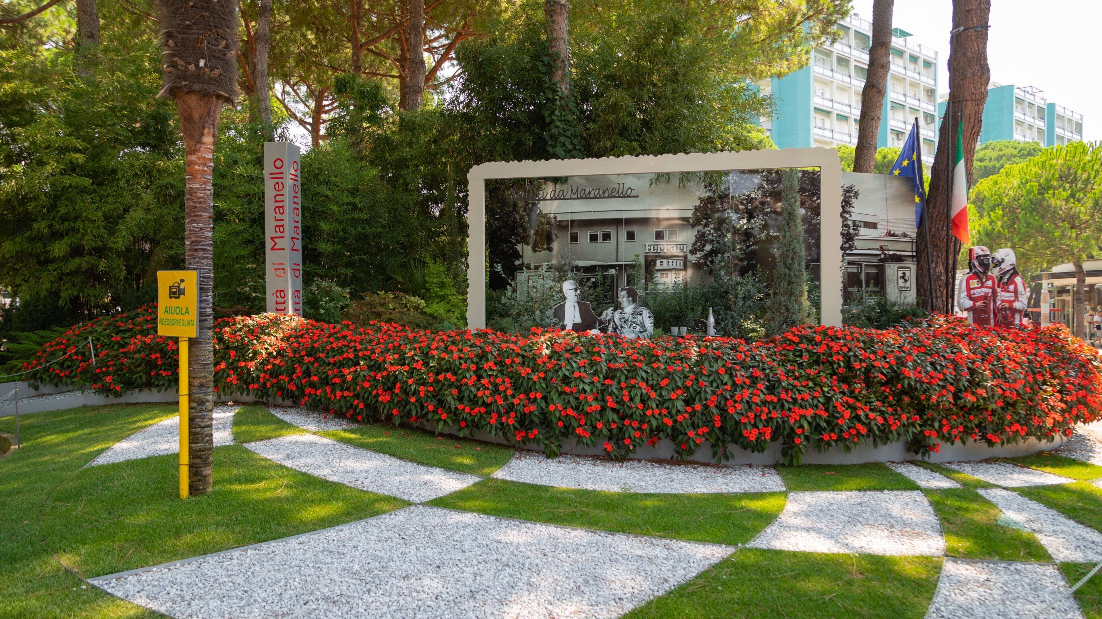 Milano Marittima showing a garden, flowers and outdoor art