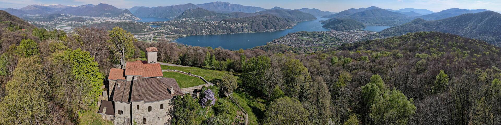 Drone view at the church of Santa Maria over Iseo on Malcantone valley in Switzerland