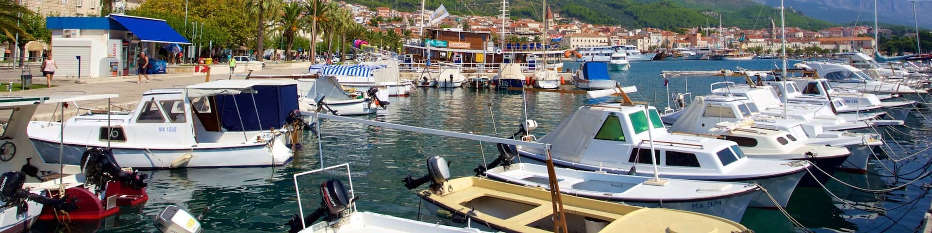 Makarska featuring a marina and mountains
