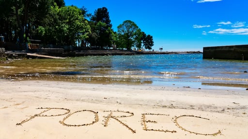Porec, the name of the town in Croatia, written in sand on the beach in Porec