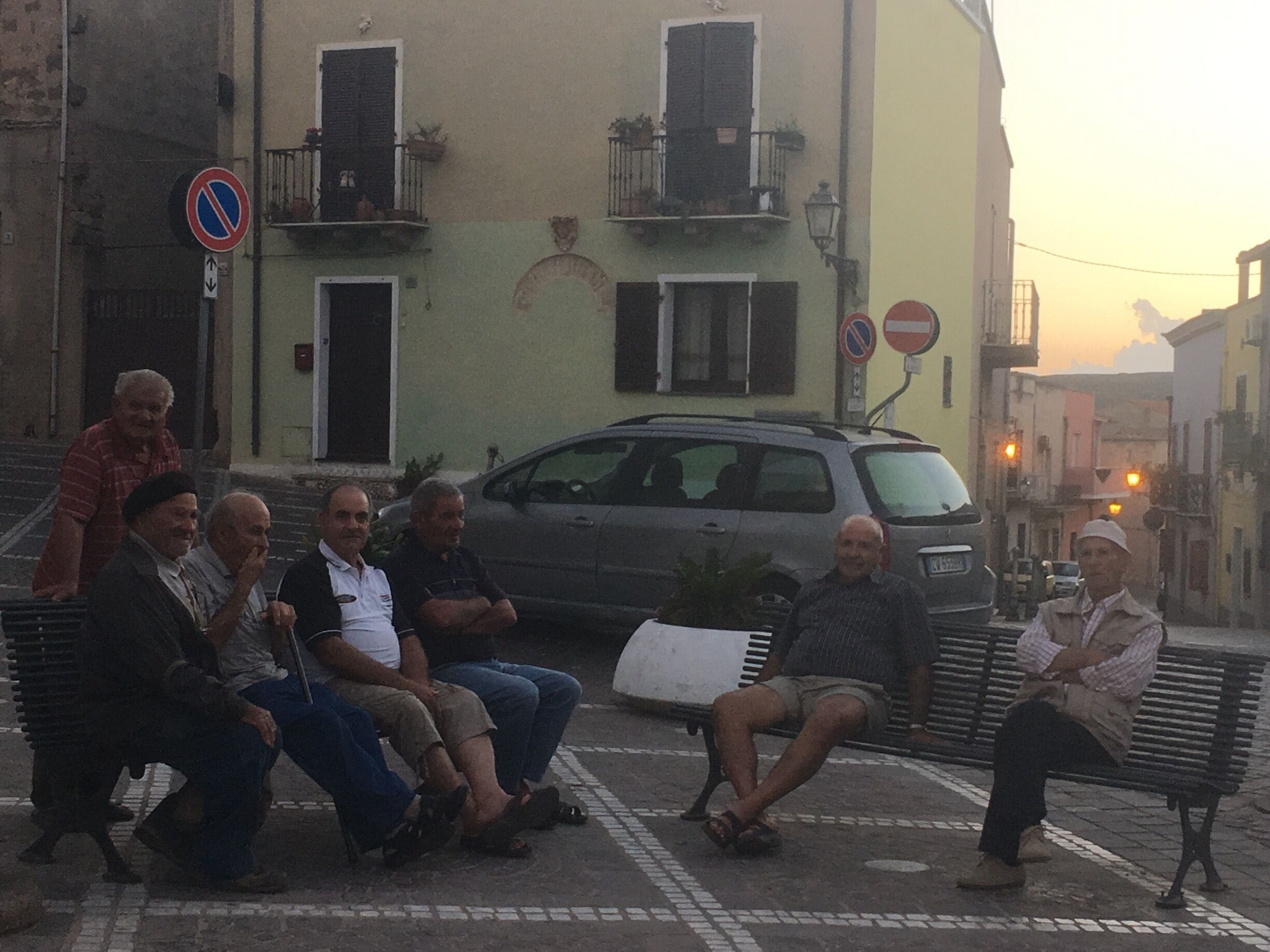 These men looked like they gathered at the piazza every evening to chat.  They all took off precisely at 8pm presumably to go home for dinner.