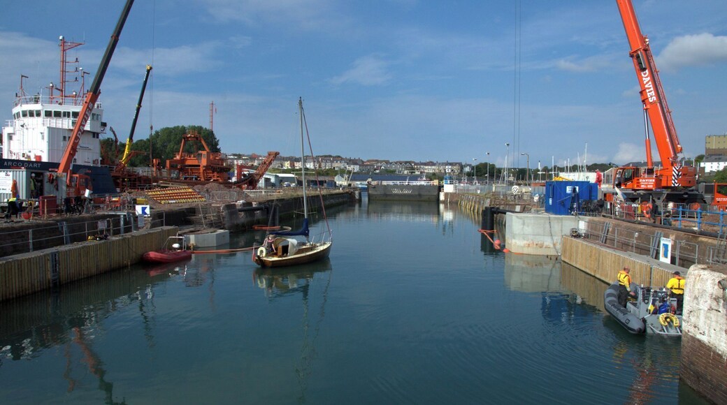 Work in progress on £6 Million project to install additional set of lock gates at Milford Haven to facilitate passage of small leisure craft more easily.