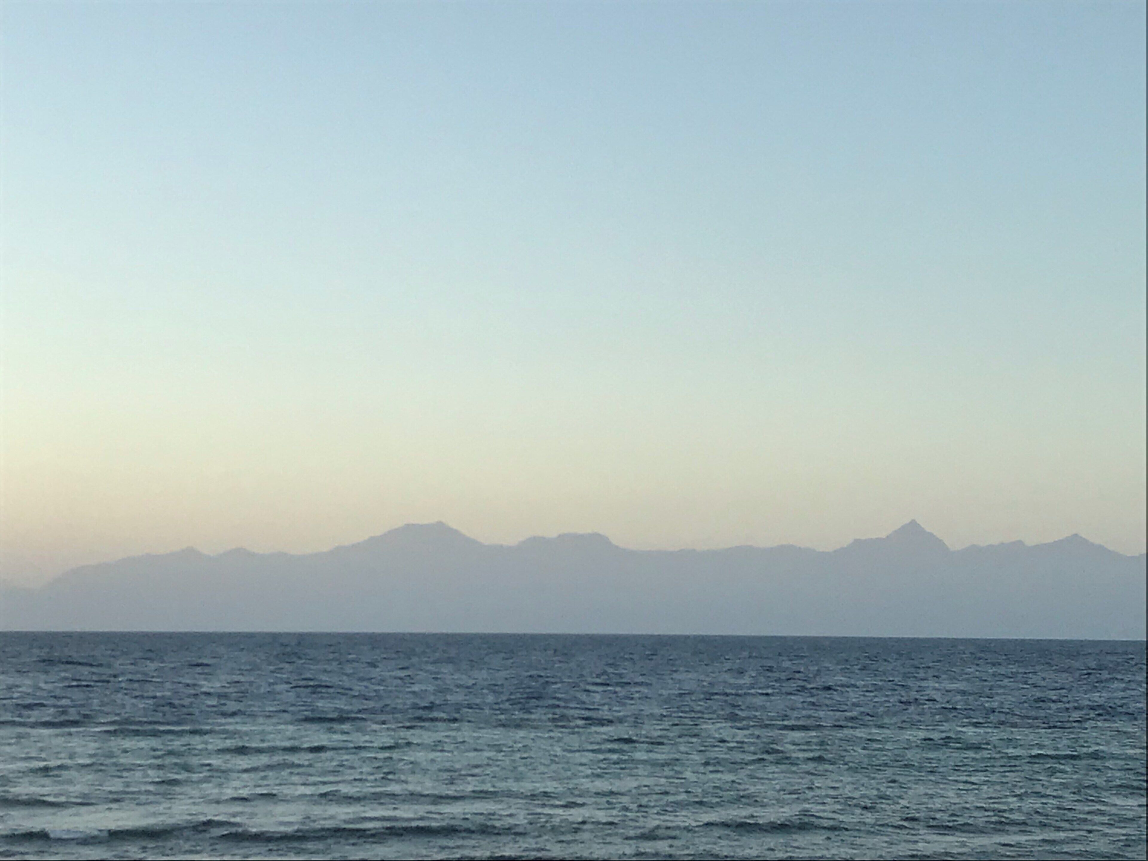 View of mainland Honduras from Bando beach Utila, Honduras