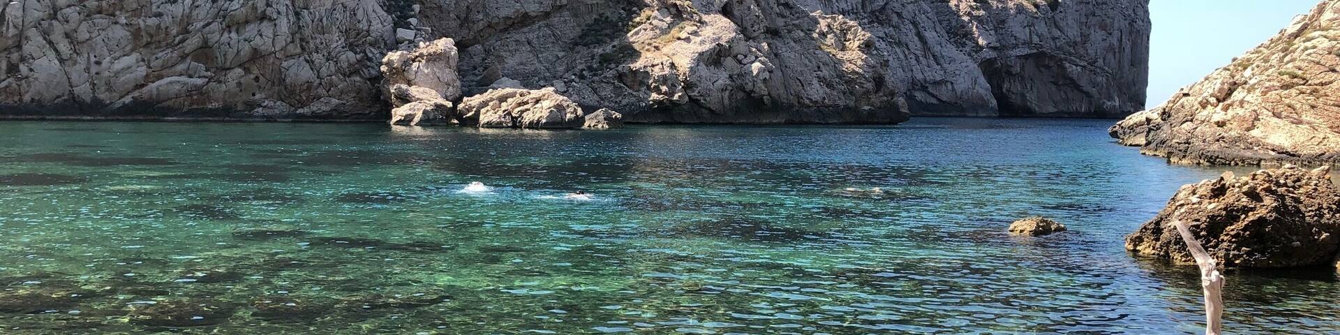 Worth the walk (around 3 miles round trip on a steep rocky path from the car park), crystal clear water and very quiet