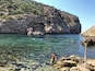 Worth the walk (around 3 miles round trip on a steep rocky path from the car park), crystal clear water and very quiet