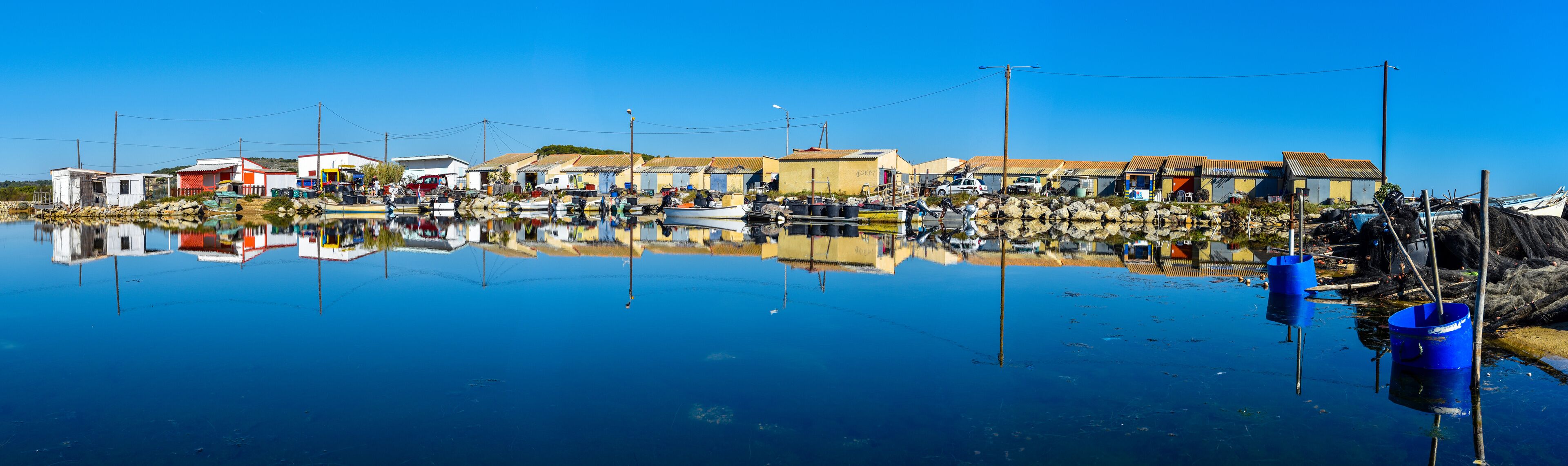 Panoramic view at Fishers village in the border of Ayroll Laguna, Narbone region of French Occitanie.