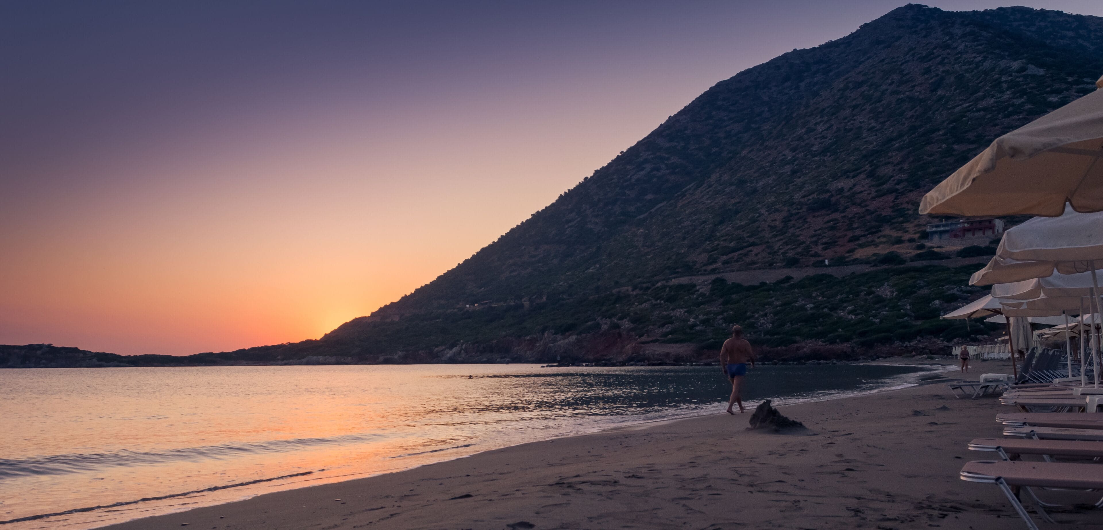 People jogging on bali beach sunrise
