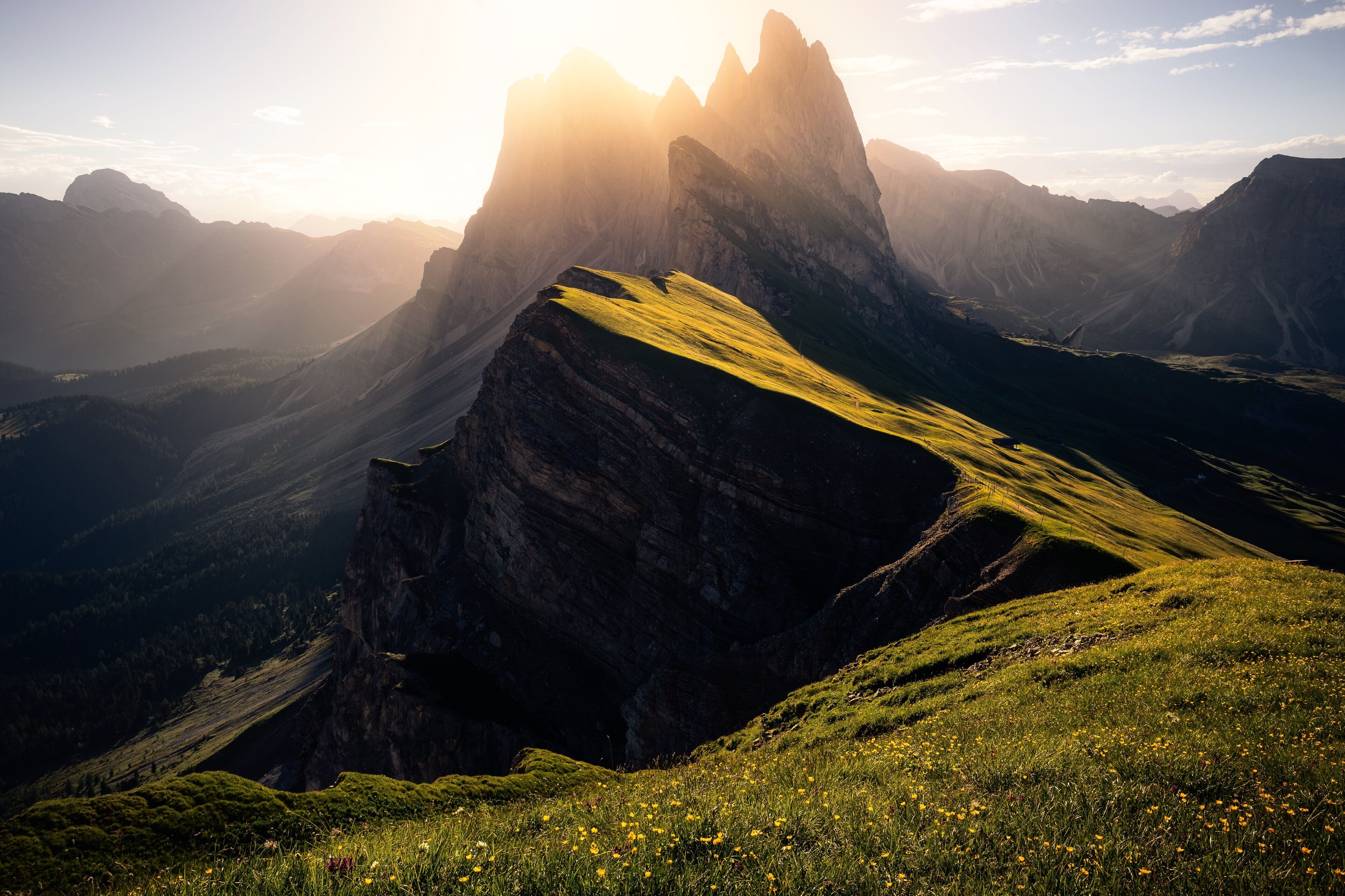 Waking up to watch the sun rise over the peaks on Seceda Mountain is an experience unlike any other. There's a cable car that takes you almost all the way to the top and plenty of huts in the area where one can spend the night. #golden