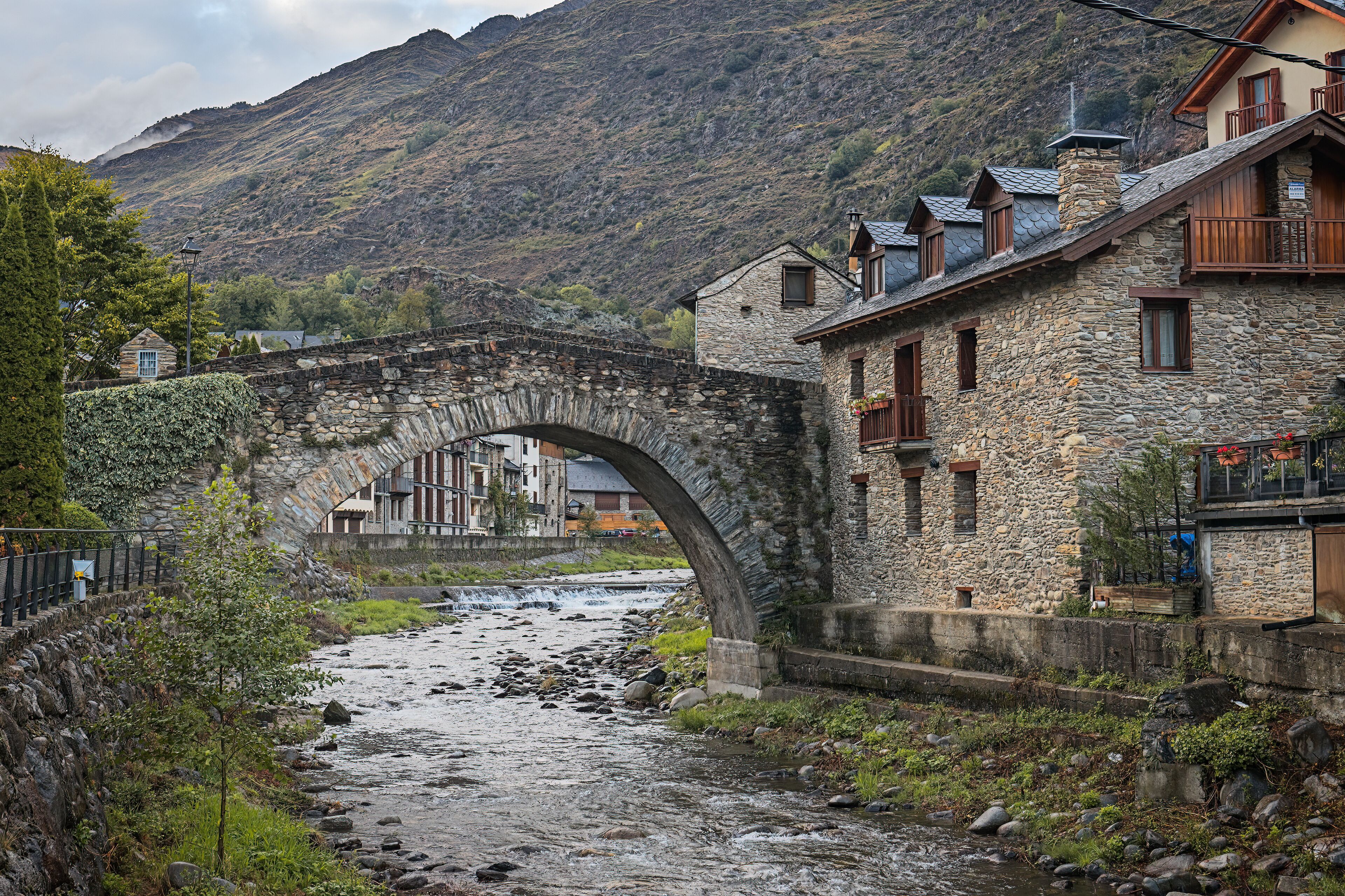 Stone Bridge in Sterri D'aNeu in the evening, Catalan Pyrenees