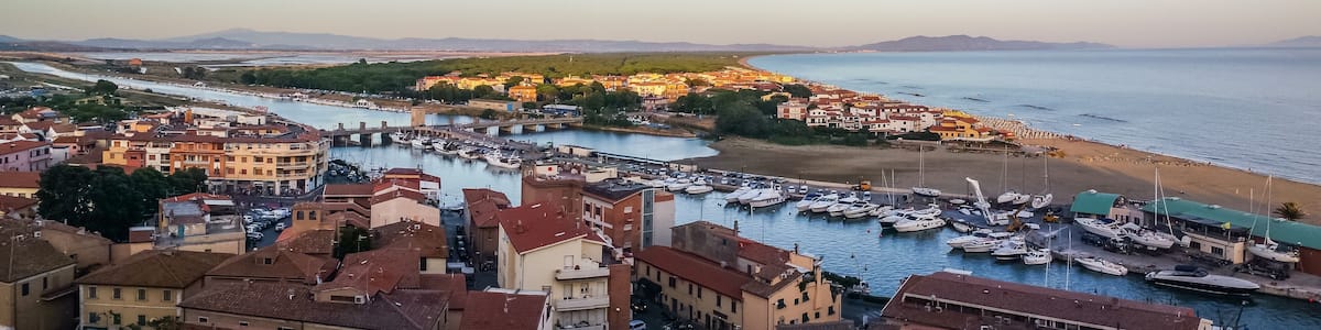 ultra wide angle view of Castiglione della Pescaia al tramonto