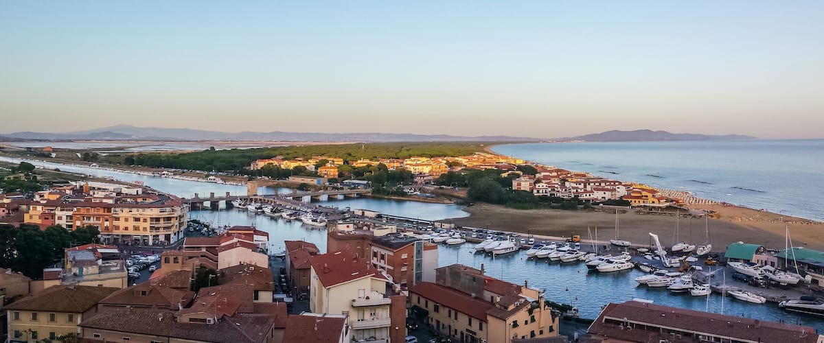 ultra wide angle view of Castiglione della Pescaia al tramonto