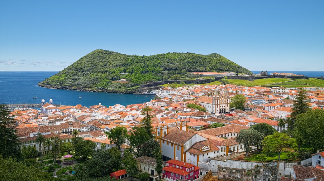 Aerial view of Angra do Heroismo city and Monte Brasil mountain, located on Azorean island of Terceira, Portugal.; Shutterstock ID 695051566; Purchase Order: -
