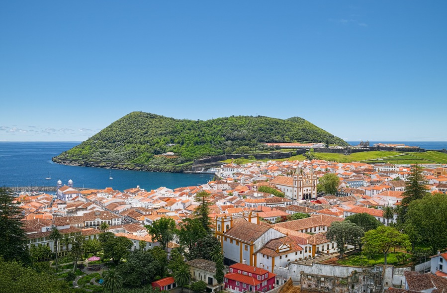 Aerial view of Angra do Heroismo city and Monte Brasil mountain, located on Azorean island of Terceira, Portugal.; Shutterstock ID 695051566; Purchase Order: -