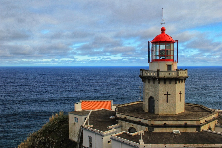 Located on the northeast coast of São Miguel, Farol do Arnel was the first lighthouse to be built in the Azores, and began operation on 26 November 1876.
It’s still a working lighthouse today, 141 years later, and is open for guided tours every Wednesday afternoon. As luck would have it, we were there on a Wednesday afternoon, but we only discovered this fact when the lighthouse keeper saw us poking around and invited us inside.
A word of warning though: if you plan to visit Farol do Arnel, park your car at the top and walk down – unless you’re a very competent driver or have an addiction to adrenaline and danger.
You can read more here:
https://galloparoundtheglobe.com/top-13-sights-not-to-miss-on-a-road-trip-around-sao-miguel-the-azores-portugal/