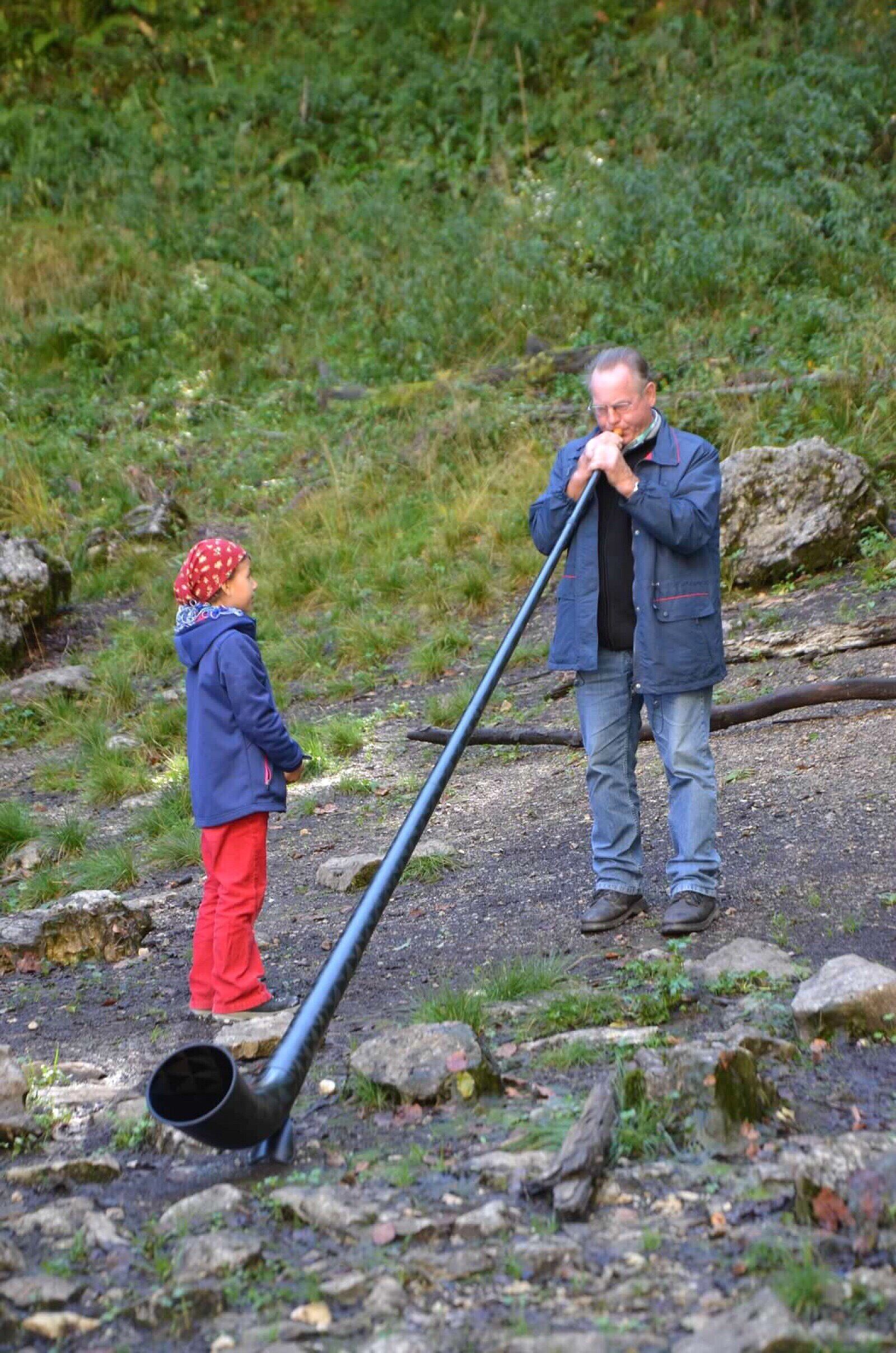 One of my favorite memories from our honeymoon was when we took the 3-Seen-Tour through the Lake District near Gössl in Austria. For each leg of the three lakes, you grouped with different sets of people based on how much time it took you to complete the walking portion of the tour. On our third leg, we were in a small boat with an outboard motor that landed next to a path where you hiked to the third lake. Upon arrival in the valley where the third lake was found nearly dried up, one of the people in our group took out an Alpine horn and began playing the most beautiful music. Listening to the sounds of the song echoing through the valley was absolutely incredible. He let each of the kids in the group try it out with remarkable patience. #mountains #troveon