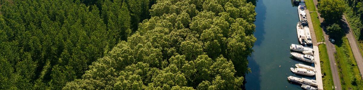 Aerial view Canal du Midi at Castets in Dorthe and boats, Gironde