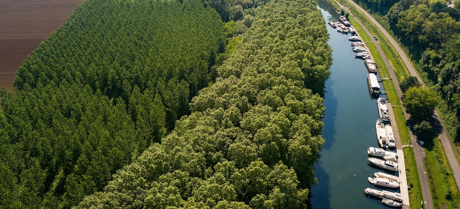 Aerial view Canal du Midi at Castets in Dorthe and boats, Gironde