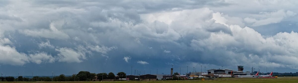 Photostitch of Leeds & Bradford Airport with stormy skies