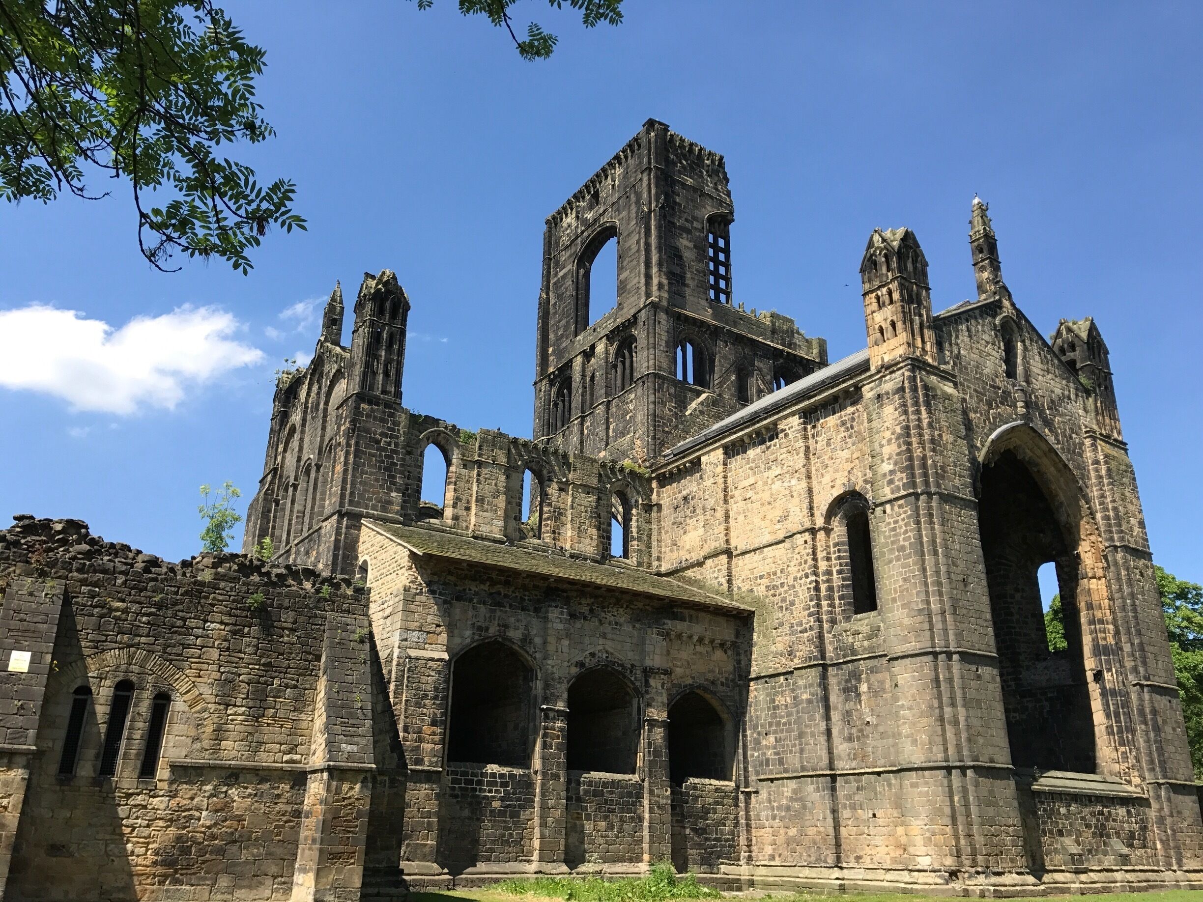 Kirkstall Abbey is a ruined Cistercian monastery in Kirkstall, north-west of Leeds city centre in West Yorkshire, England. It is set in a public park on the north bank of the River Aire. 