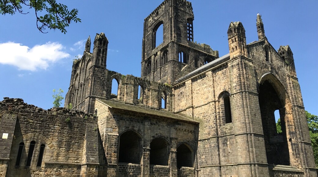 Kirkstall Abbey is a ruined Cistercian monastery in Kirkstall, north-west of Leeds city centre in West Yorkshire, England. It is set in a public park on the north bank of the River Aire.