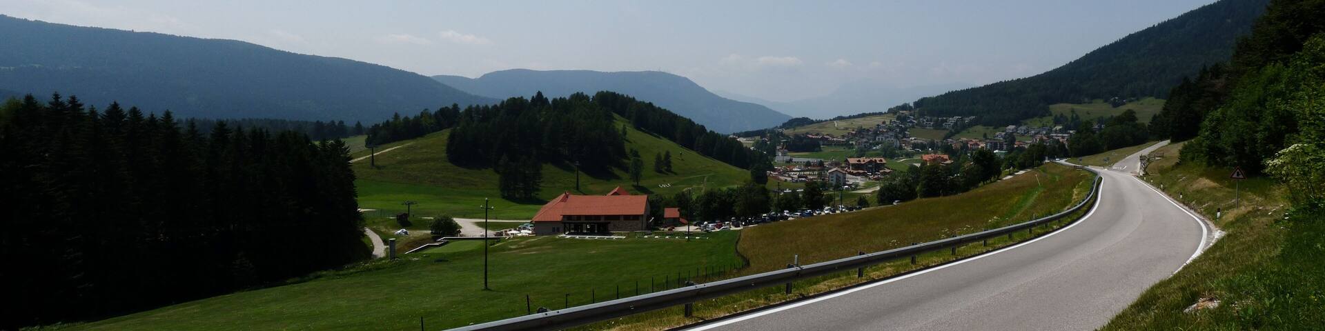 Folgaria (Italy): view of the village of Costa, descending from Passo Sommo.