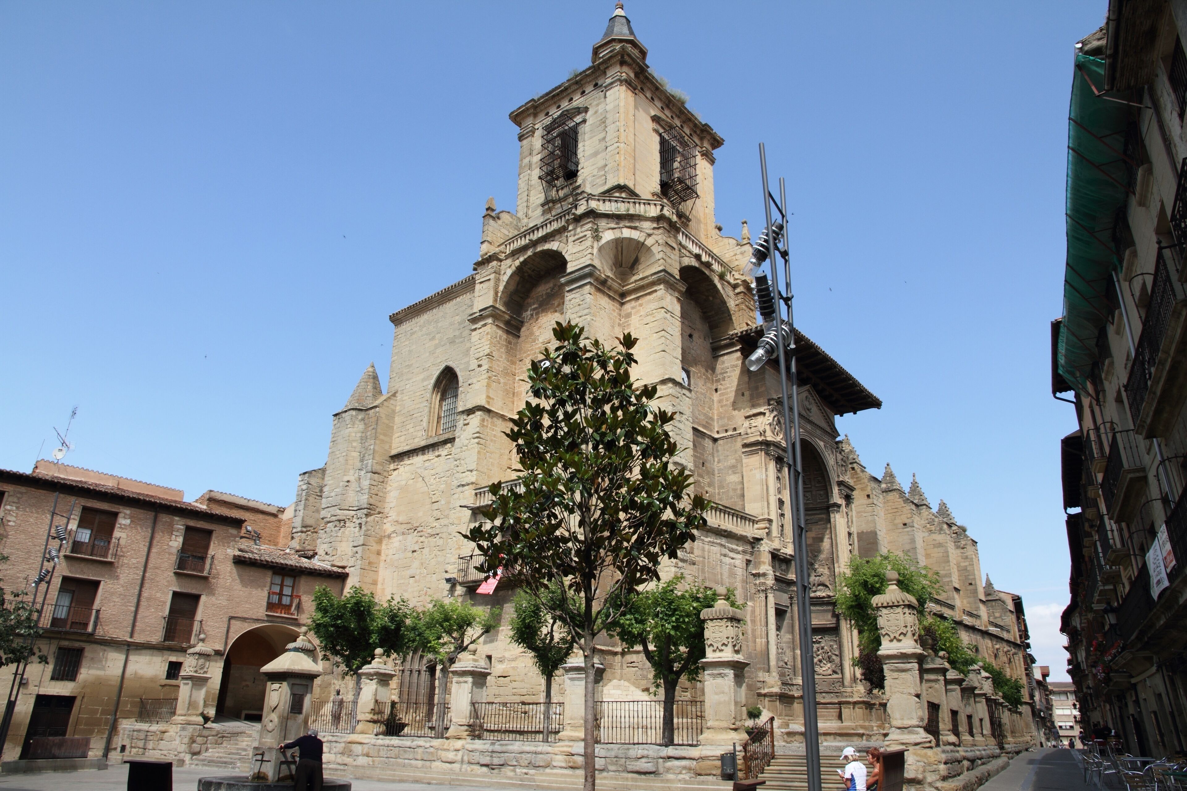 A historic church with a bell tower and arched windows.