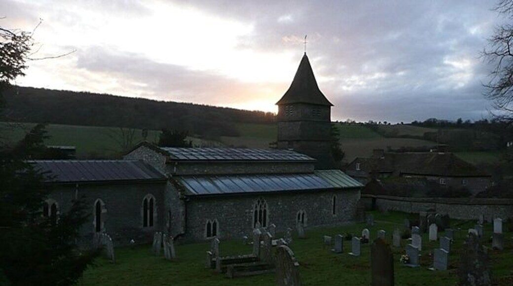 St. Peter's church, Hurstbourne Tarrant The north side from the steeply rising churchyard with the sun setting over Wallop Hill Down behind. The 17th century clerestory roof is clearly seen from this angle, as is the 15th century three-stage weatherboarded bell tower. There is more information here http://www.astoft.co.uk/hurstbourne.htm