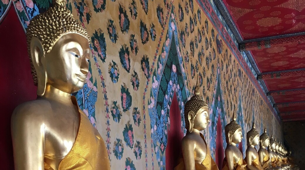 So many beautiful temples are dotted around Bangkok. Wat Sutat is remarkable: white marble and Buddha statues aligned to perfection.