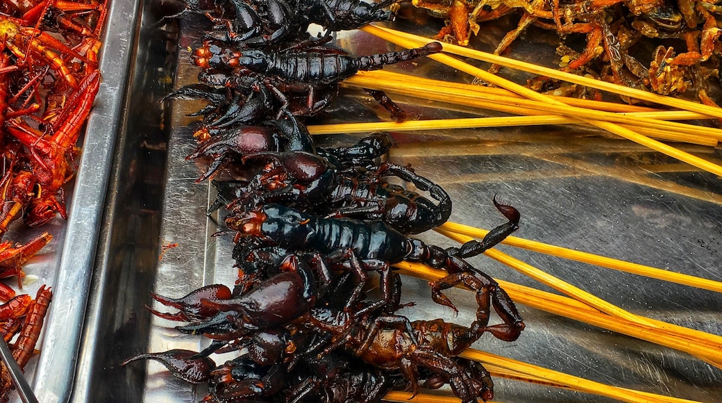One person's "Yuck" is another's "Yum". Coming across a bug cart of edible insects in #Chinatown #Bangkok; Ready to eat #scorpions. Tasty for some, but scary for others. #BugBuffet #Bugcart #ChinatownBangkok #Edibleinsects #Thailand. Try some just #LikeALocal #Trovember