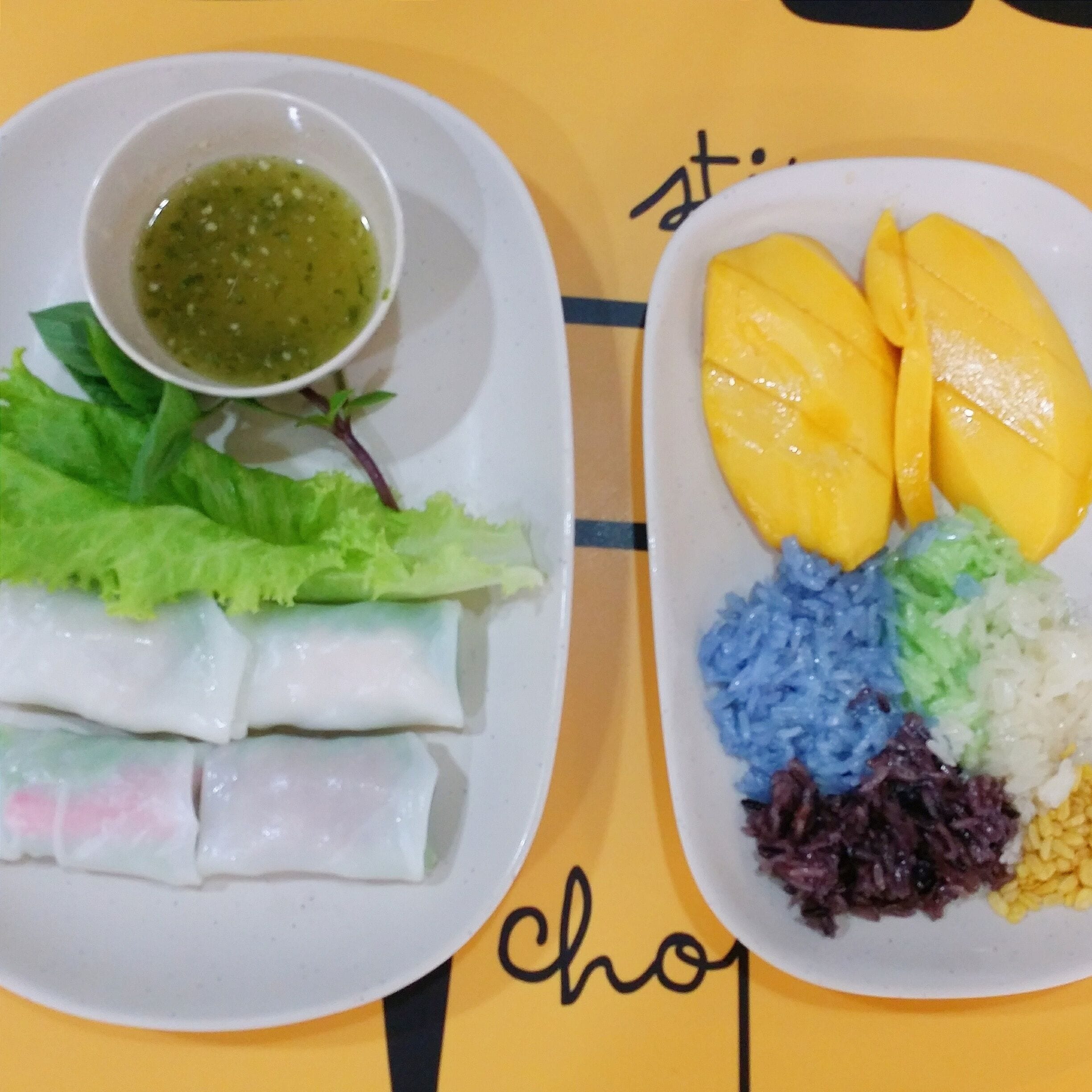 Mango sticky rice (with different colored rice) and fresh spring roll sampler at Food Choices