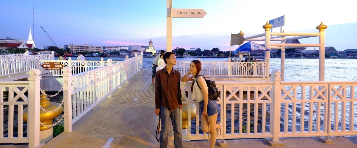 At the river side just before sunset.The sky is beautiful , people walking by , some are waiting for the boat , some are chatting , But I was taking pictures😃