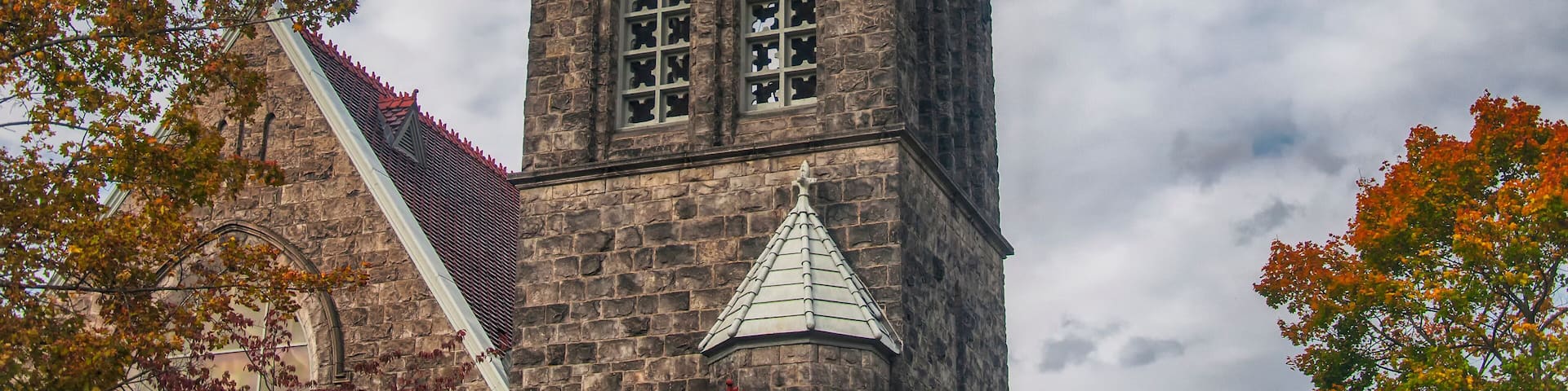 The landmark Christ Episcopal church in autumn in Corning New York